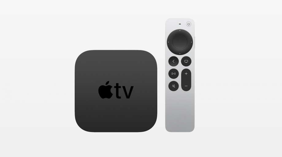 Black Apple TV box and its white remote with black keys, all on a white background