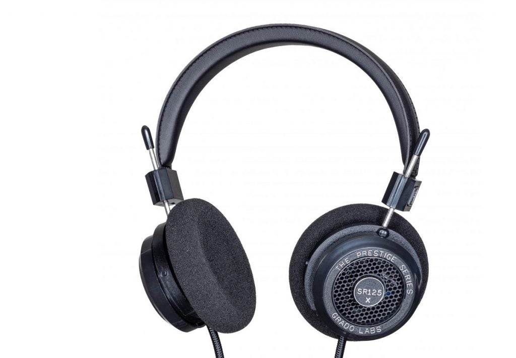 A black Grado SR125X headphone on a white background