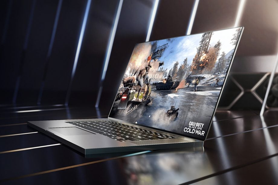 A silver metal finish Nvidia GeForce RTX 3050 laptop in a lighting reflective metallic sorrounding