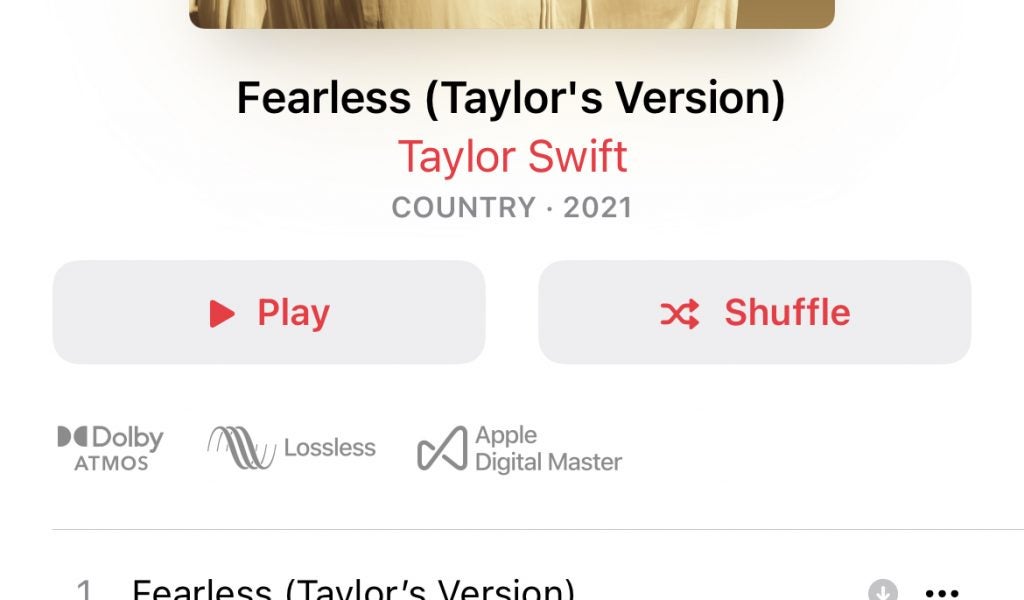 An image displaying Fearless (Taylor's version) song with a play and shuffle button below
