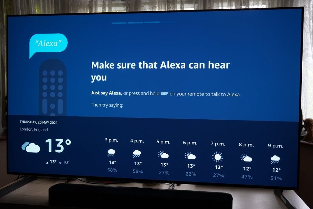 LG G1 OLED TV displaying Alexa control guide and weather forecast below it