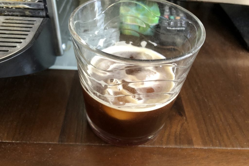 The final glass of iced coffee from a Nespresso machine