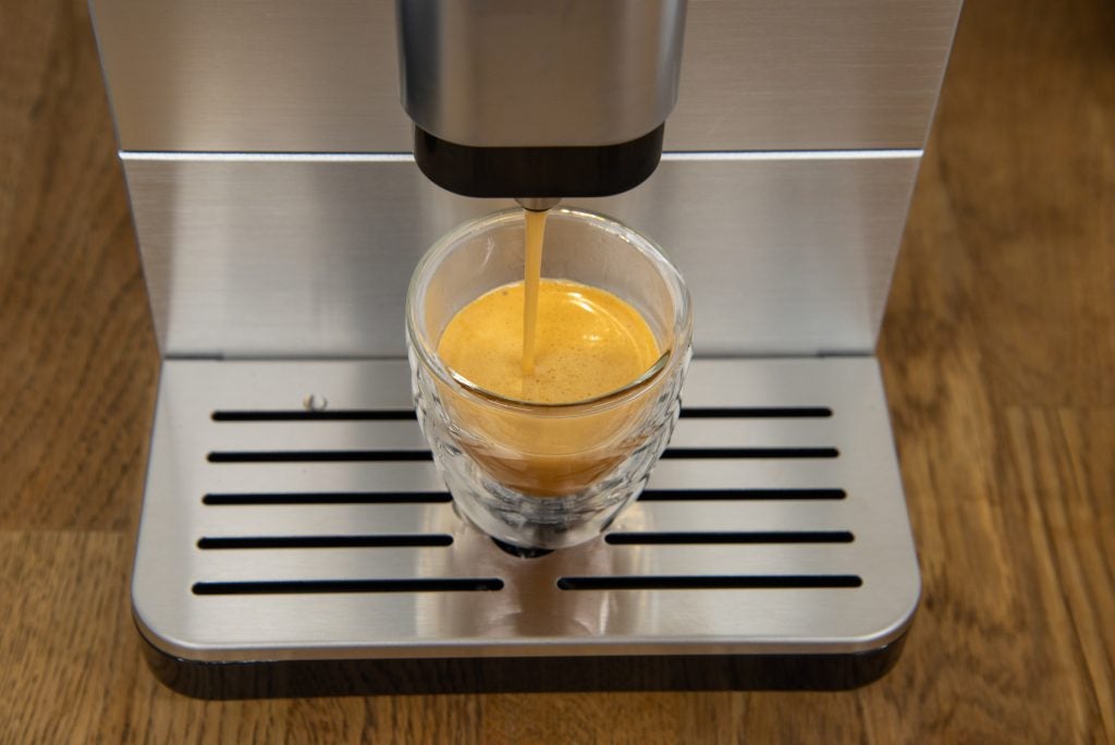 Beko Bean To Cup Coffee Machine CEG5301 pouring espresso
