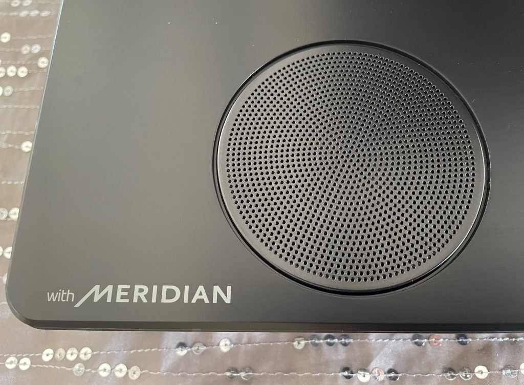 Close-up of LG SP11RA soundbar speaker with Meridian branding