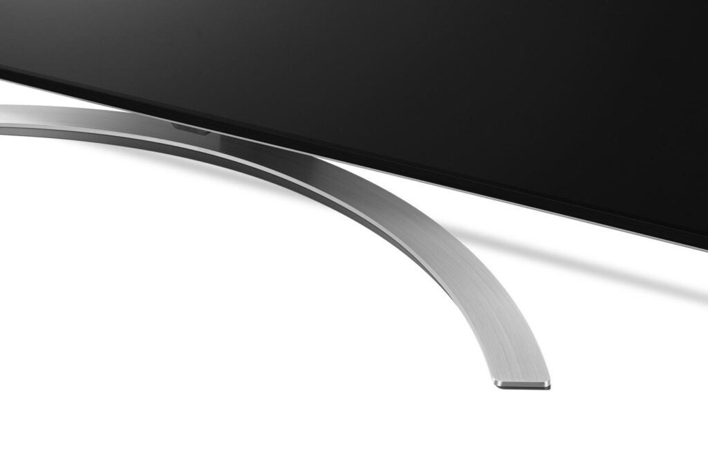 The LG 75QNED99 sits on an attractive metallic crescent-shaped stand if you're not wall mounting it.