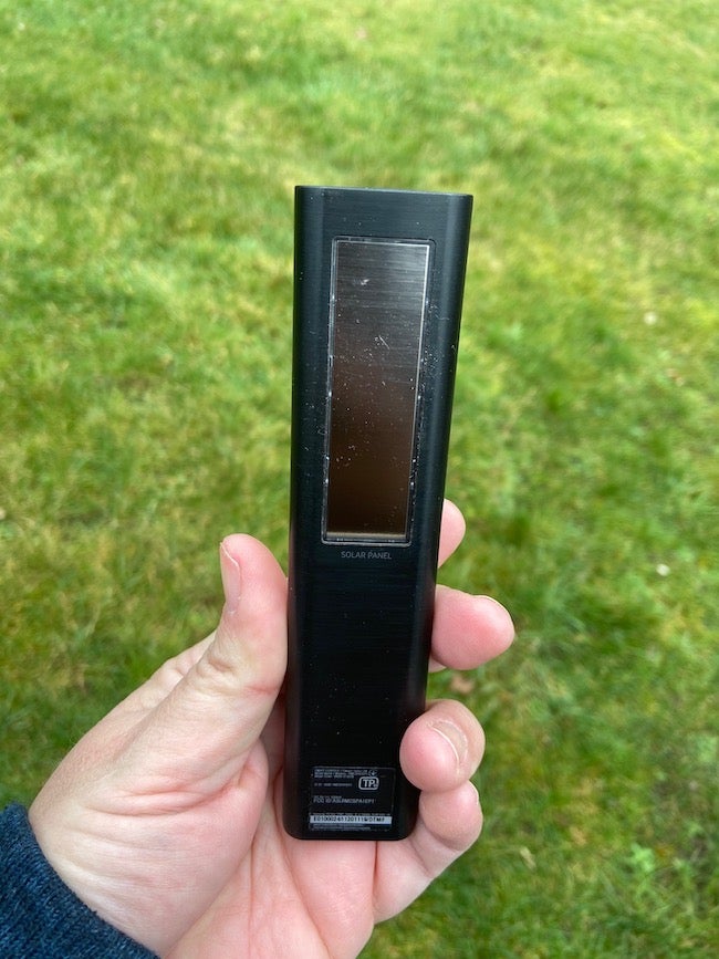 The Samsung 75QN900A's remote control features a solar panel on its rear.