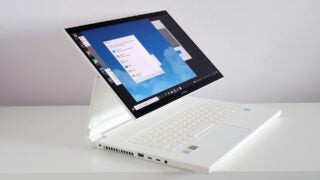 Acer ConceptD 3 Ezel Pro laptop in ezel mode on desk.