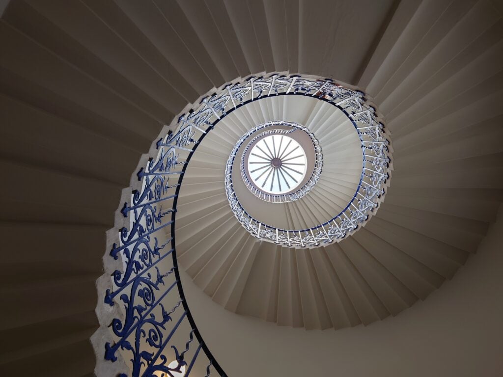 Spiral staircase viewed from the bottom up.