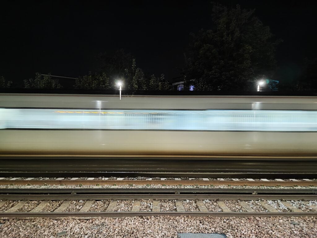 Blurred motion of train at night captured on Xiaomi 11T Pro.