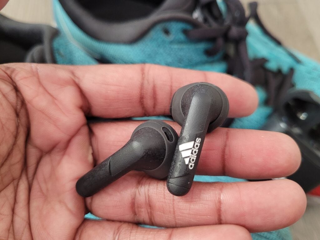 Adidas Z.N.E 01 earbuds in hand