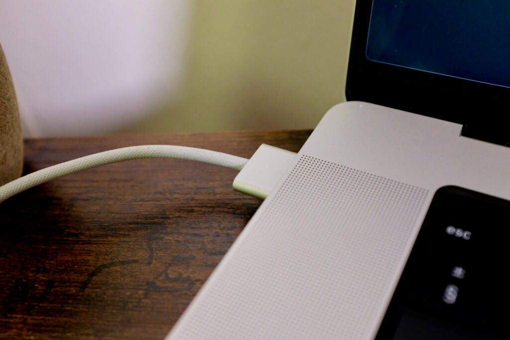 MagSafe charger sticking out of laptop's side