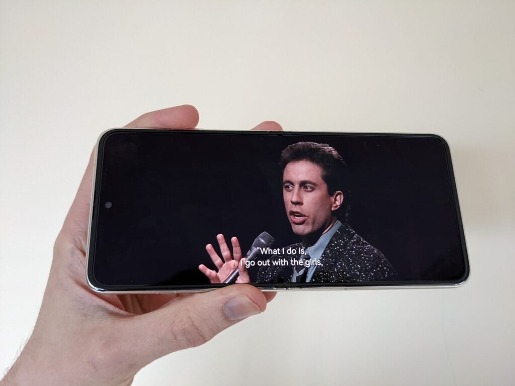 Huawei P50 Pocket unfolded and watching Seinfeld on Netflix
