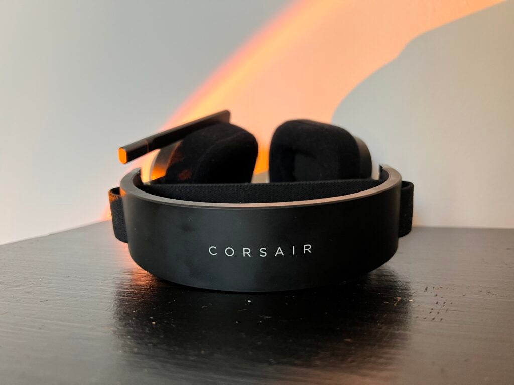 The Corsair letterings on the headset on a black desk