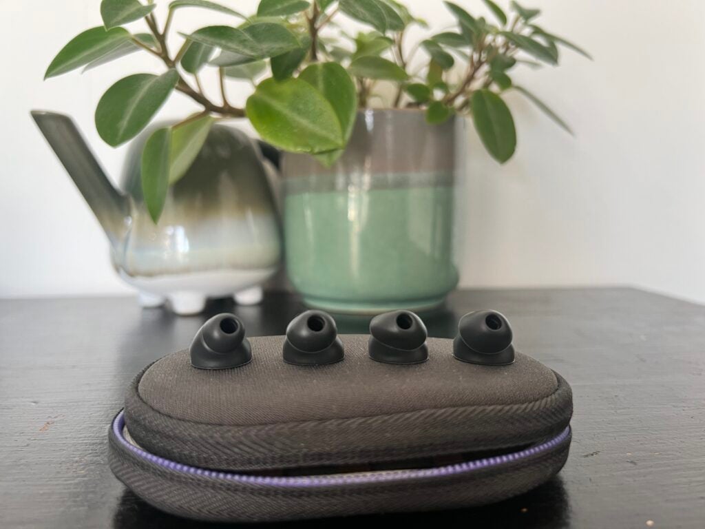 Logitech Zone Wired silicon earbuds on Logi pouch
