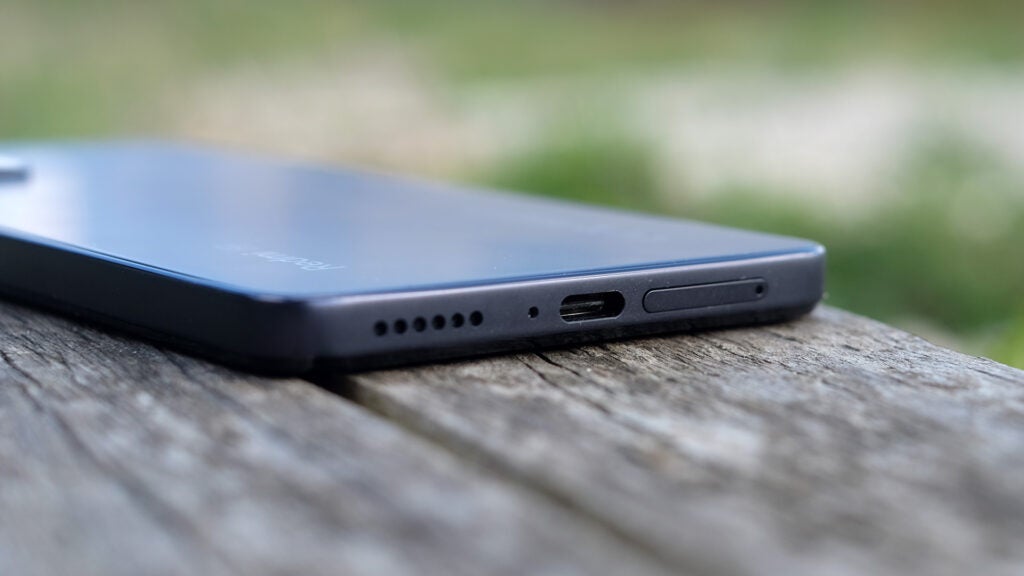 The USB-C charging port on the bottom of the phone