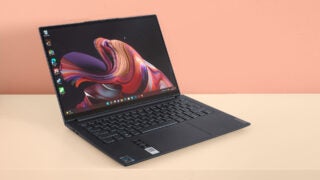 Lenovo Yoga Slim 7i Pro laptop on a two-tone background.