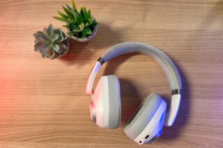 The EPOS H3PRO Headset on a desk next to some plants