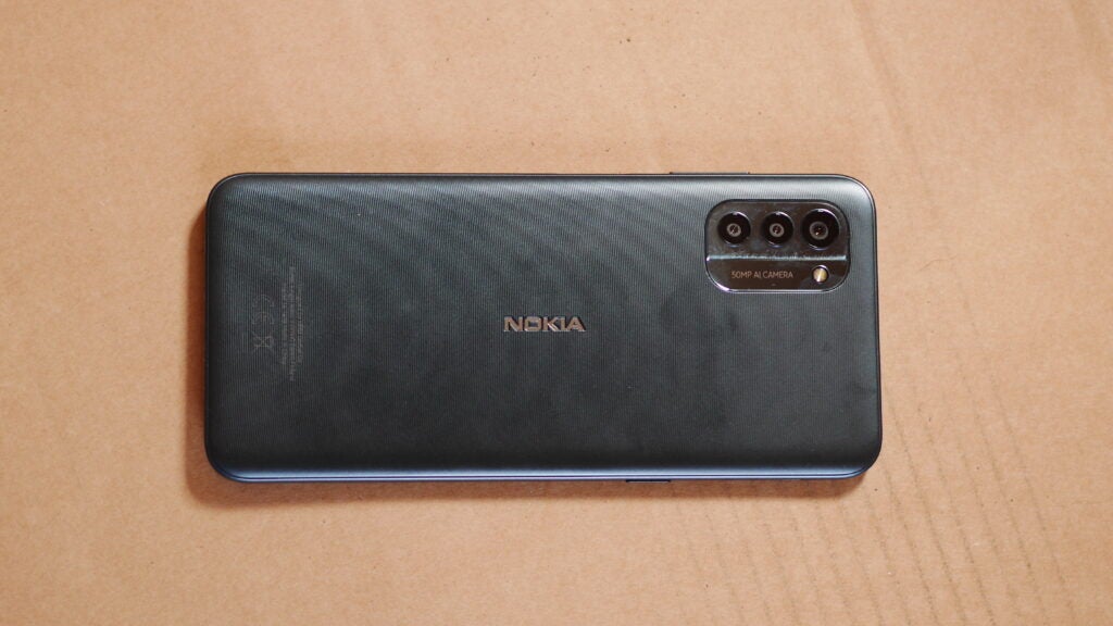 Back shot of the Nokia G21, showing its cameras and solid casing