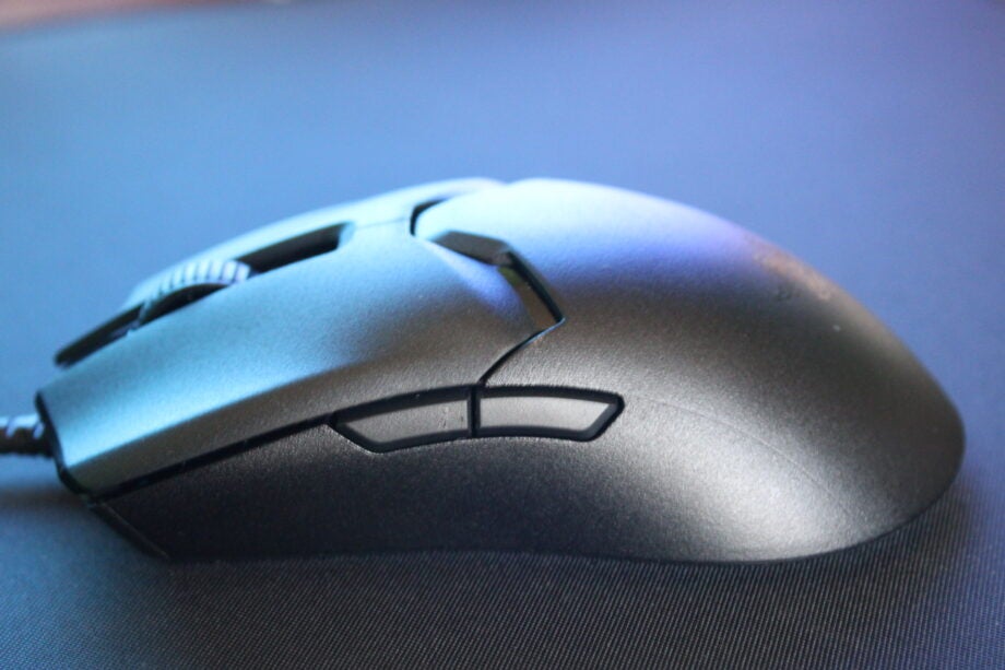 Close-up of Razer Viper V2 Pro gaming mouse on blue surface