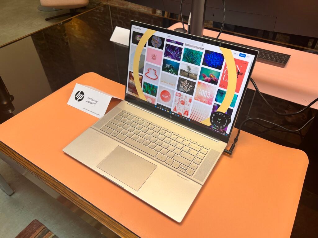 The HP Envy 16 laptop at a press event