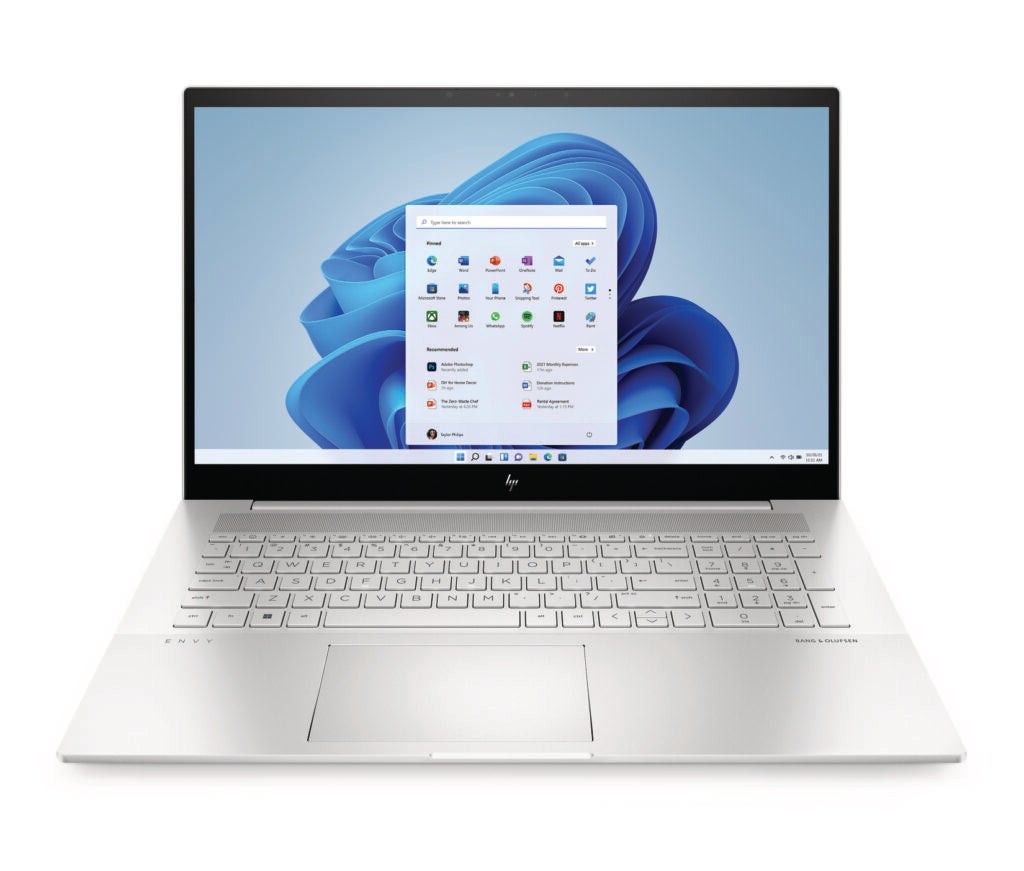 The HP Envy 17.3 in a press shoot looking white and grey