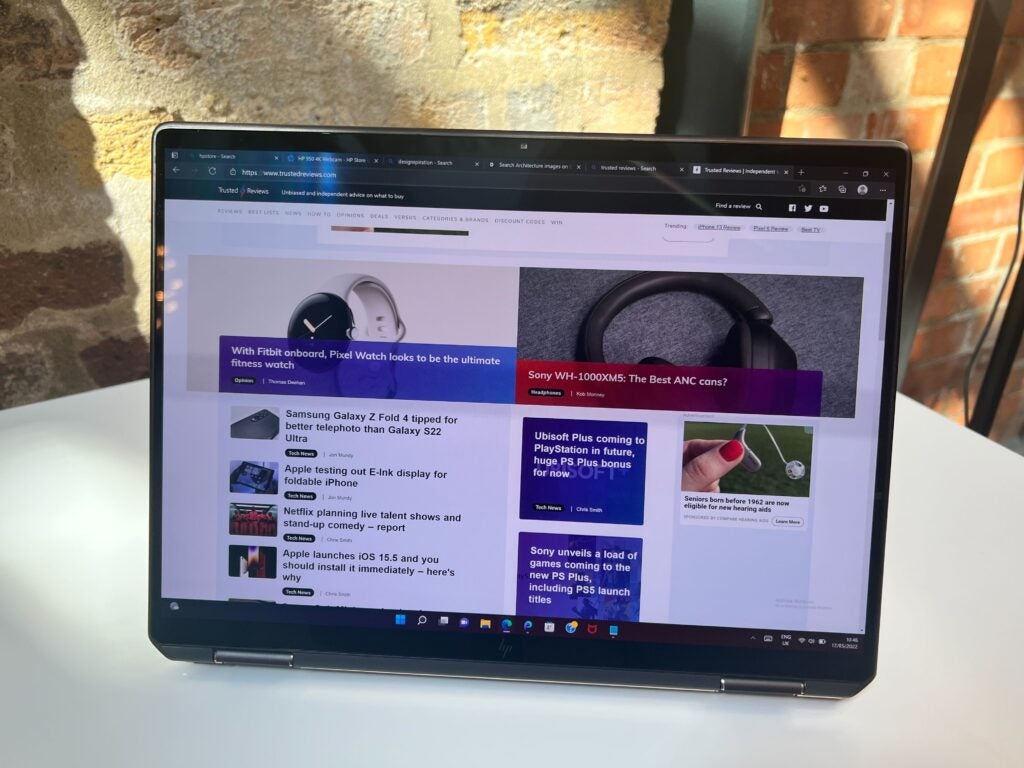 The Hp Spectre x360 in tent mode at a press event