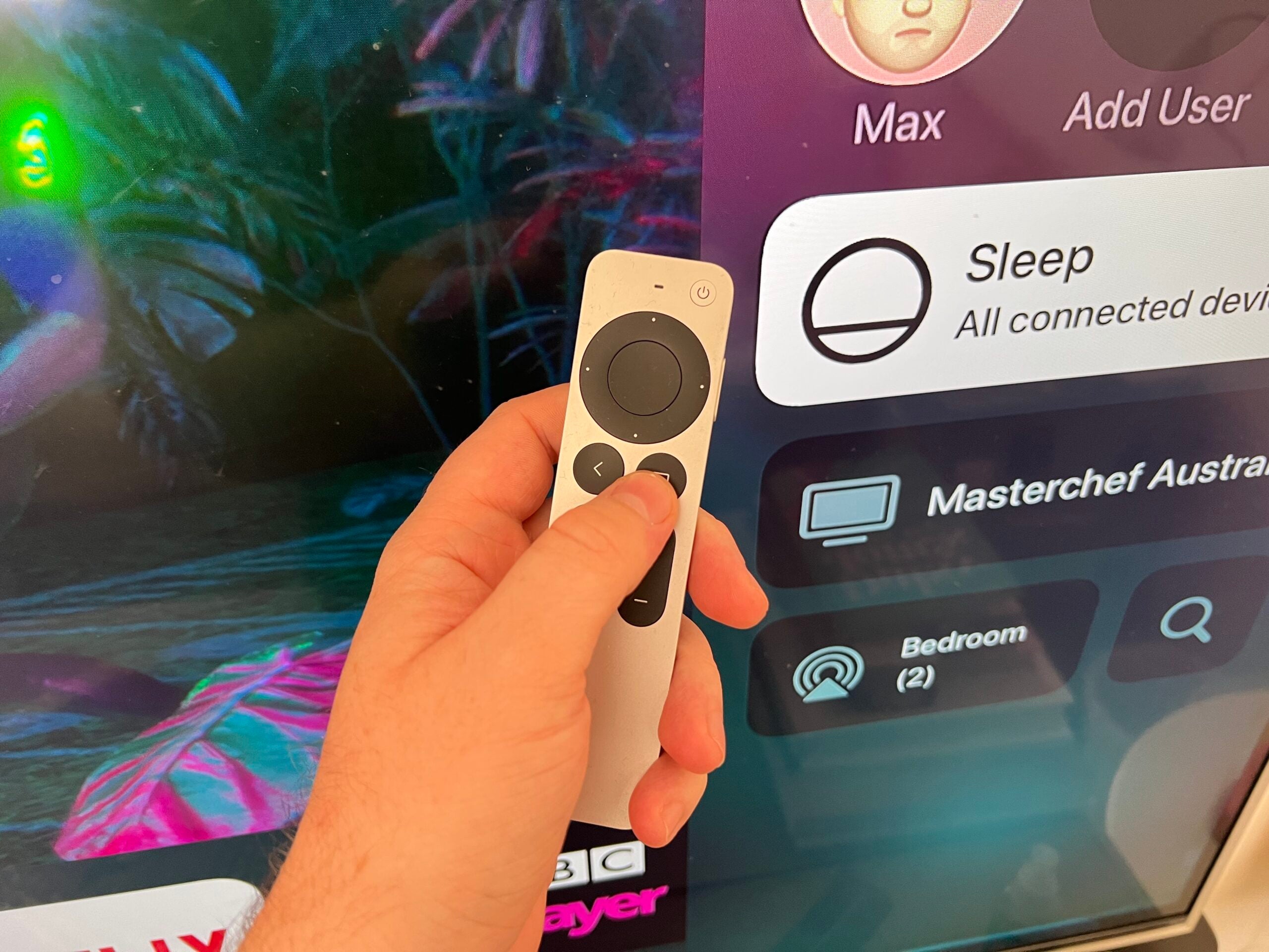 How to connect AirPods press the TV button 1