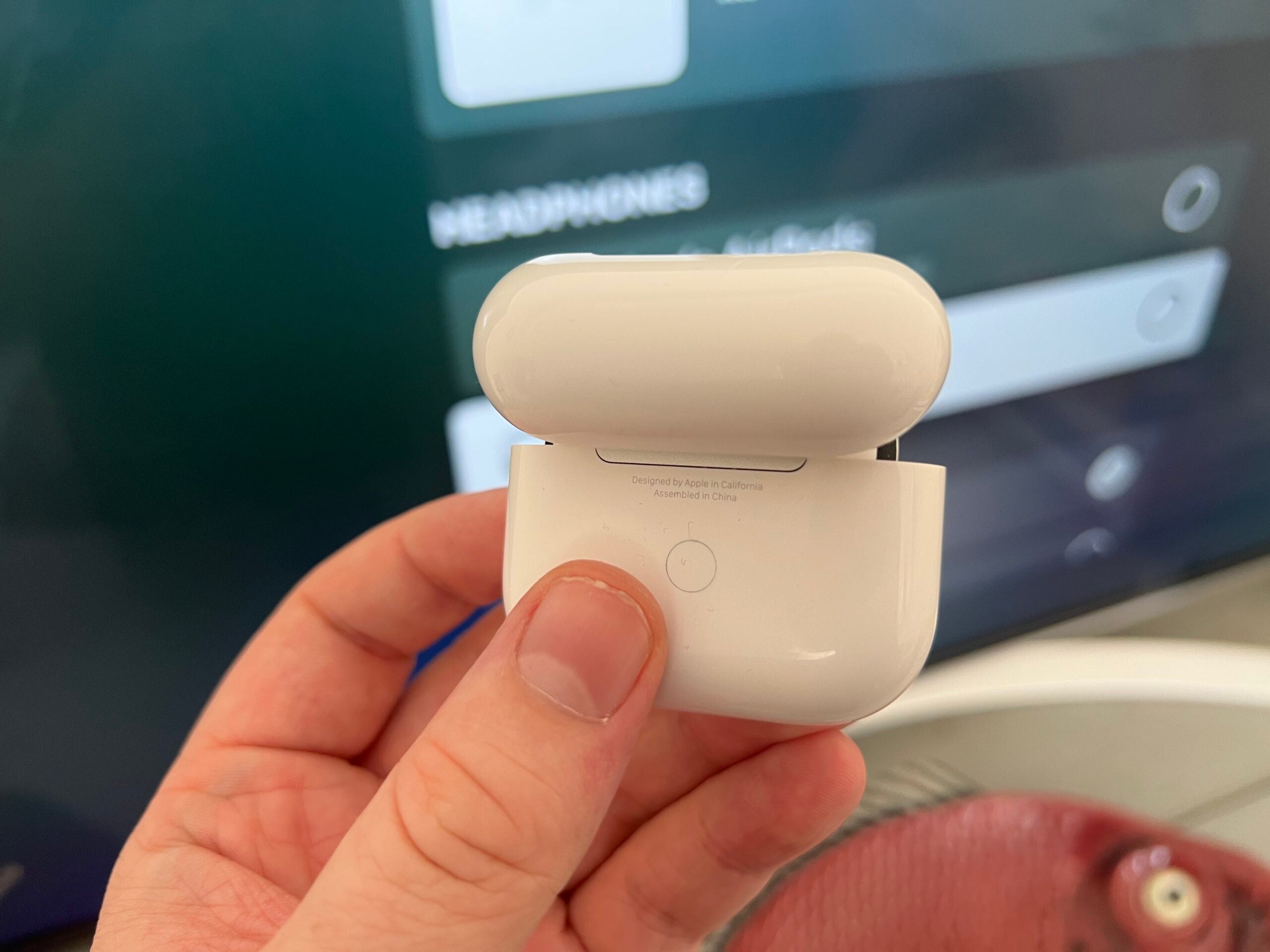 how to connect AirPods press the button on the back