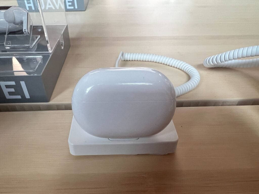 The charging case in white for the freebuds pro 2 at a press event