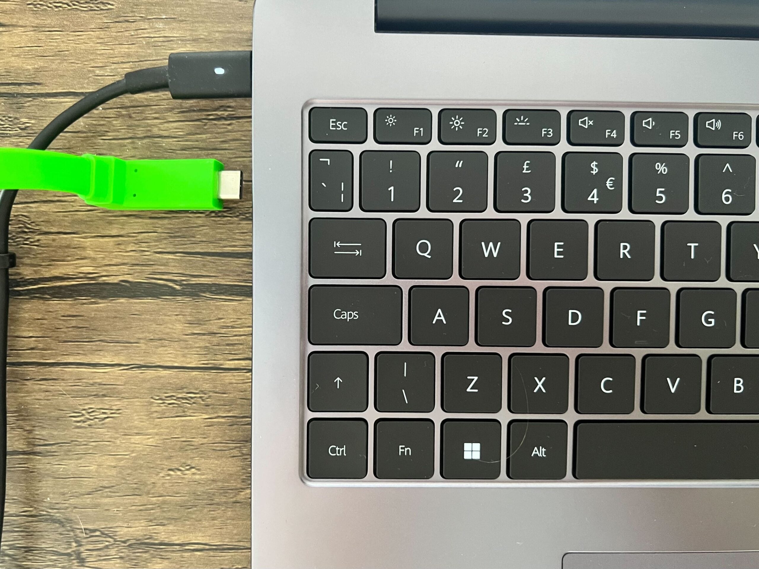 Connect a USB-C cable to your laptop to start