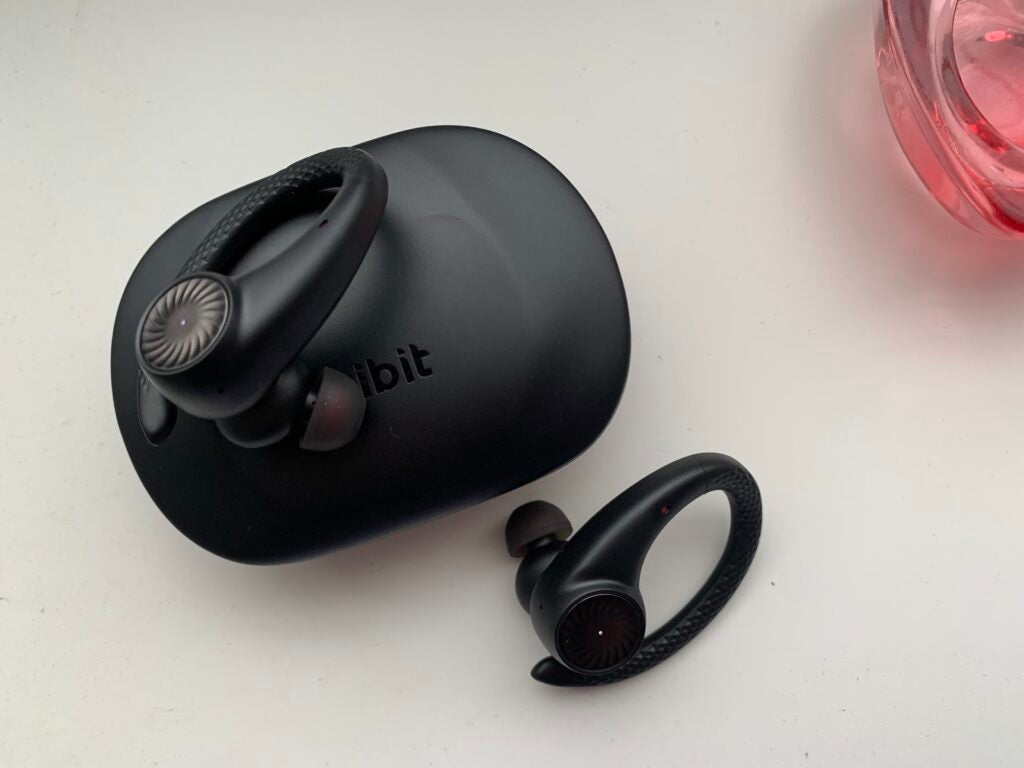 Tribit MoveBuds H1 on top of case