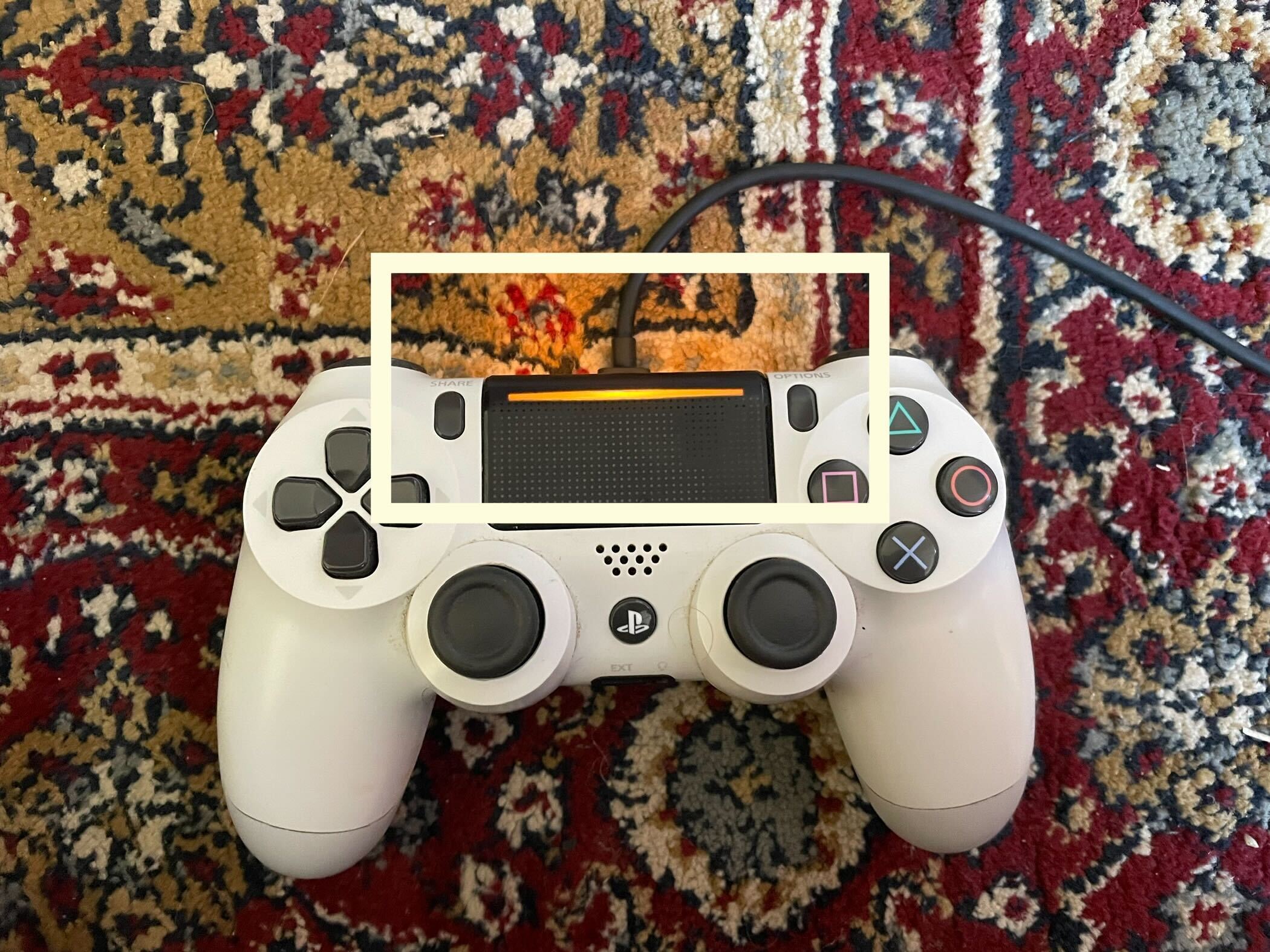 Plug the PS4 controller into the pS4 console