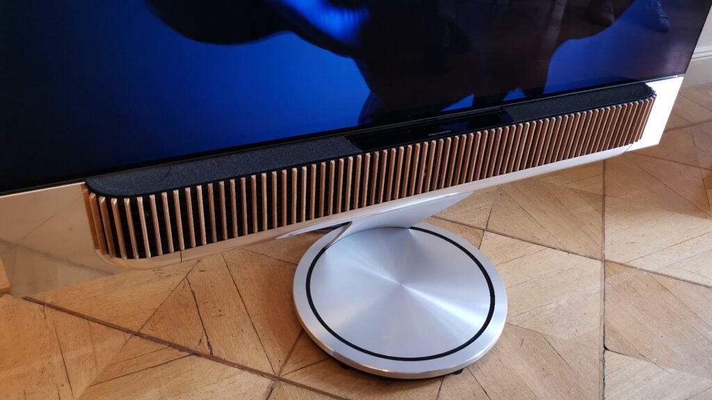 Bang Olufsen Beosound Theatre soundbar with TV on stand