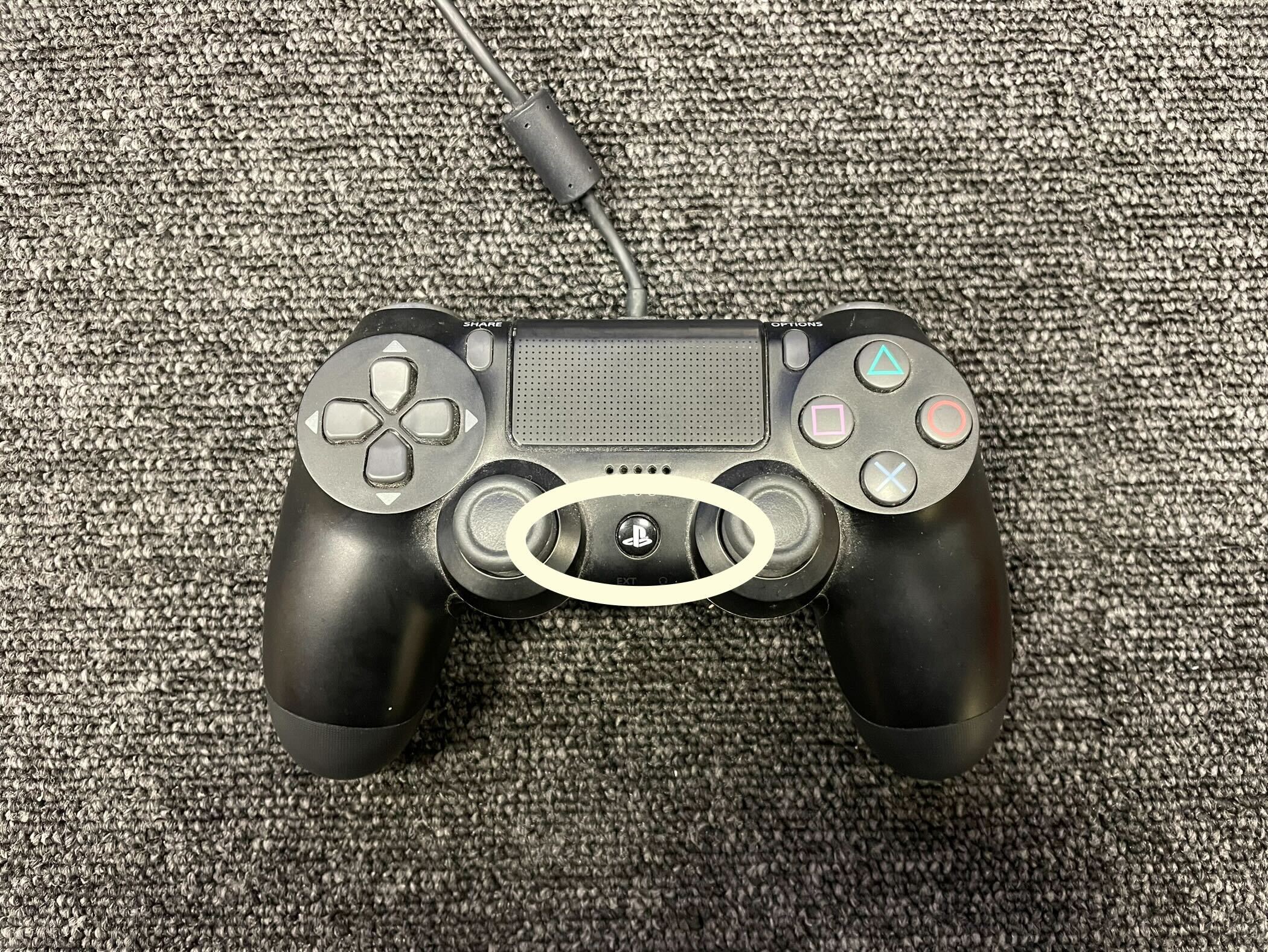 The PS button on the PS4 controller