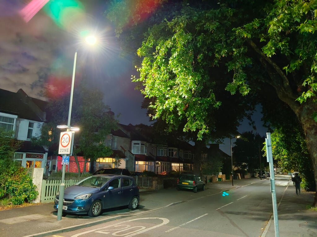 Night street scene captured with Vivo V25 smartphone camera.Night street scene captured by Vivo V25 camera.
