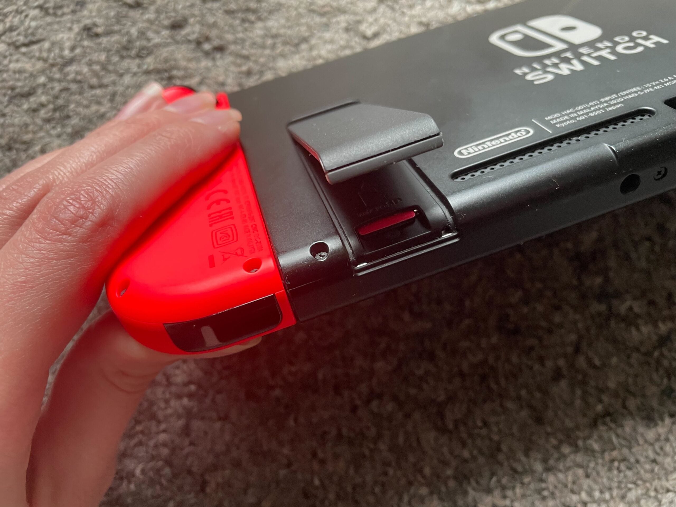 SD card fully inserted into the Switch