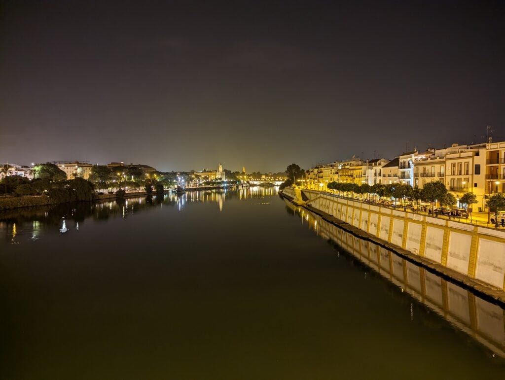Google Pixel 7 ultrawide image of Seville river at night