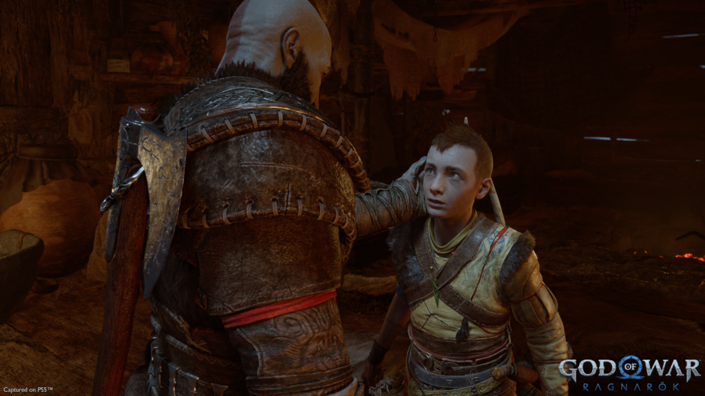 Kratos and Atreus sharing a tender moment