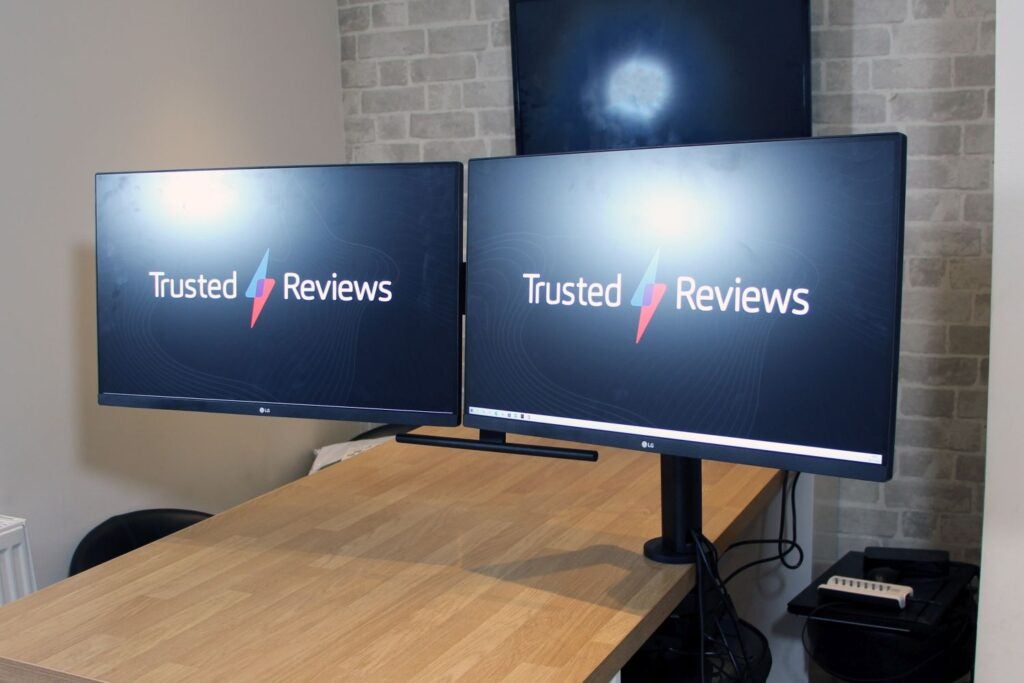 The LG Ergo Dual 27QP88D front view with Trusted Reviews logos on the screens