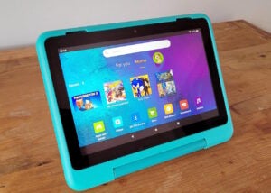 Amazon Fire HD 8 Kids Pro tablet with blue case on table.