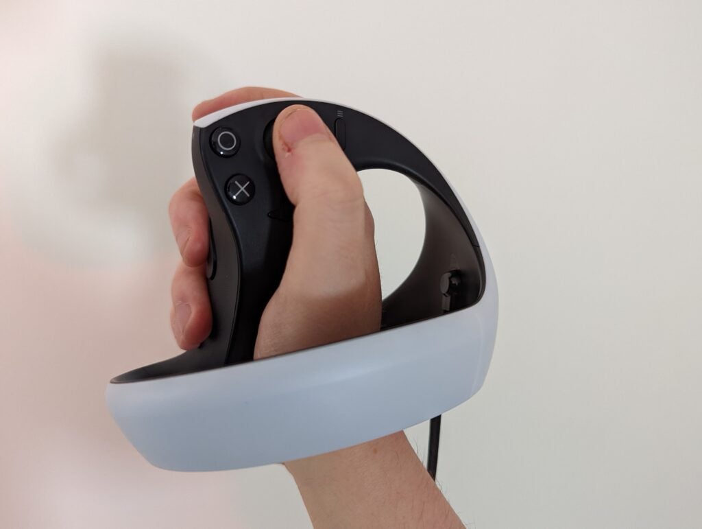 Our reviewer holding the PlayStation VR 2 controller