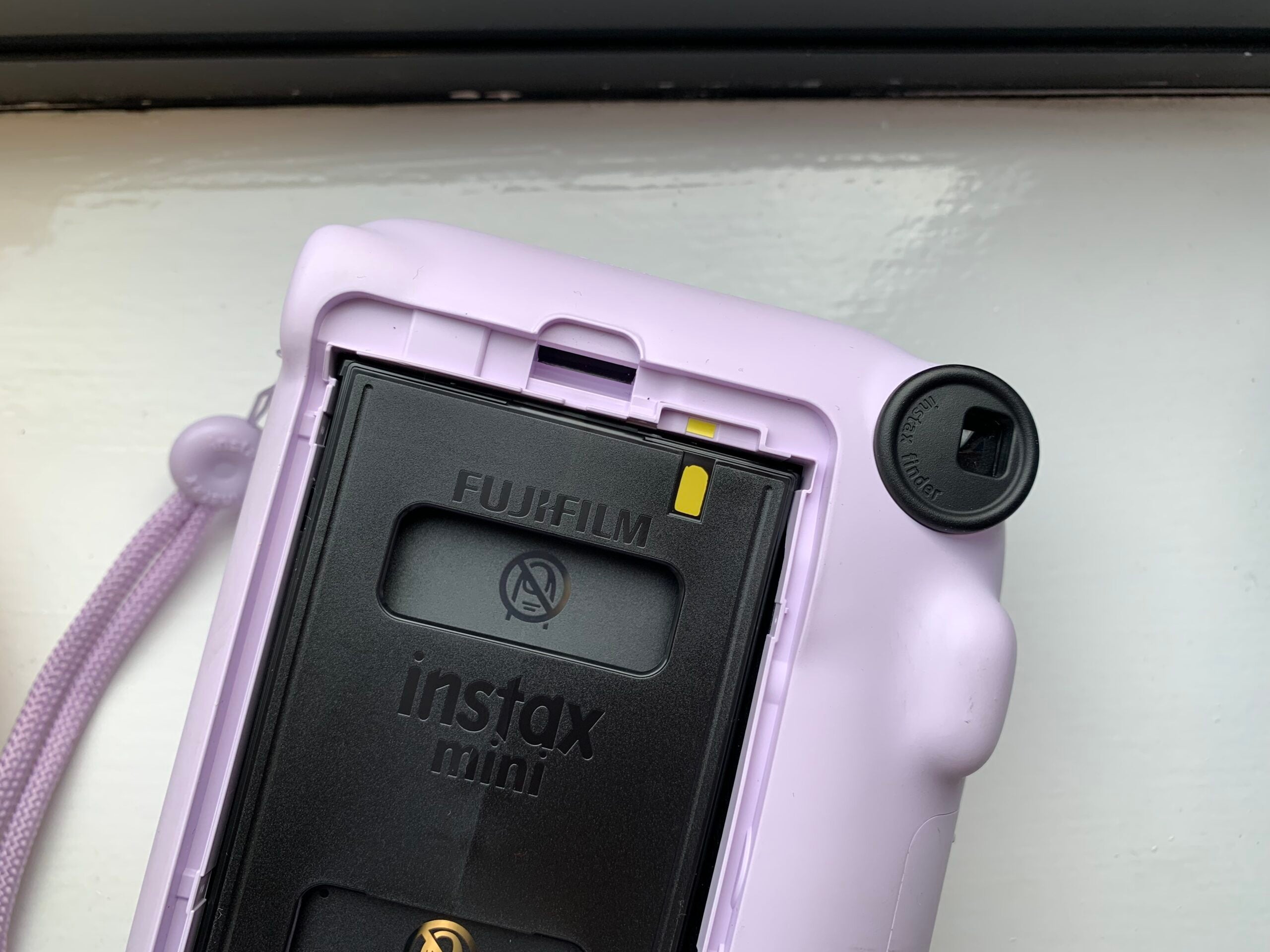 How to load film in an Instax Mini camera