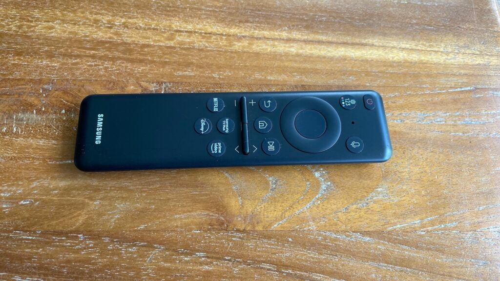 The Samsung QN95C's remote control has a solar panel on its back