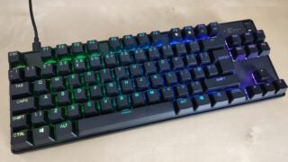 SteelSeries Apex Pro TKL keyboard with RGB lighting.