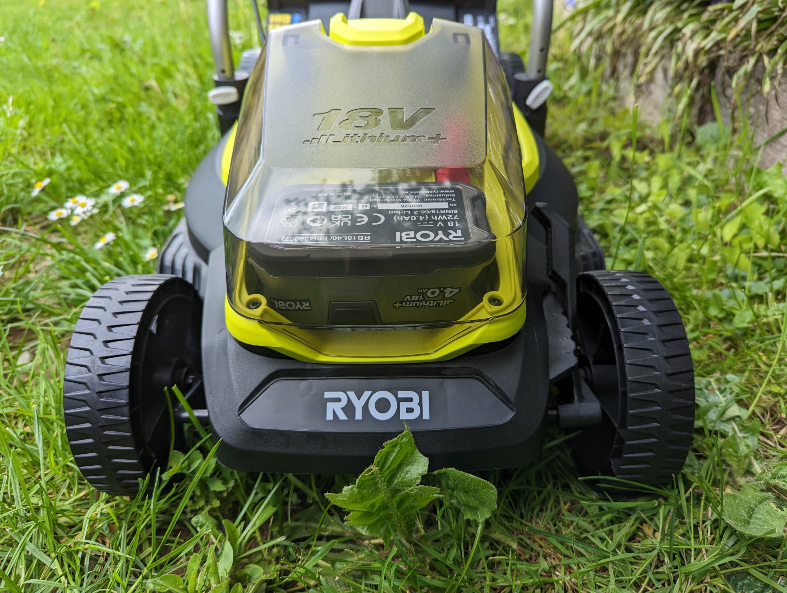 Ryobi One+ Cordless 33cm Lawnmower battery in place