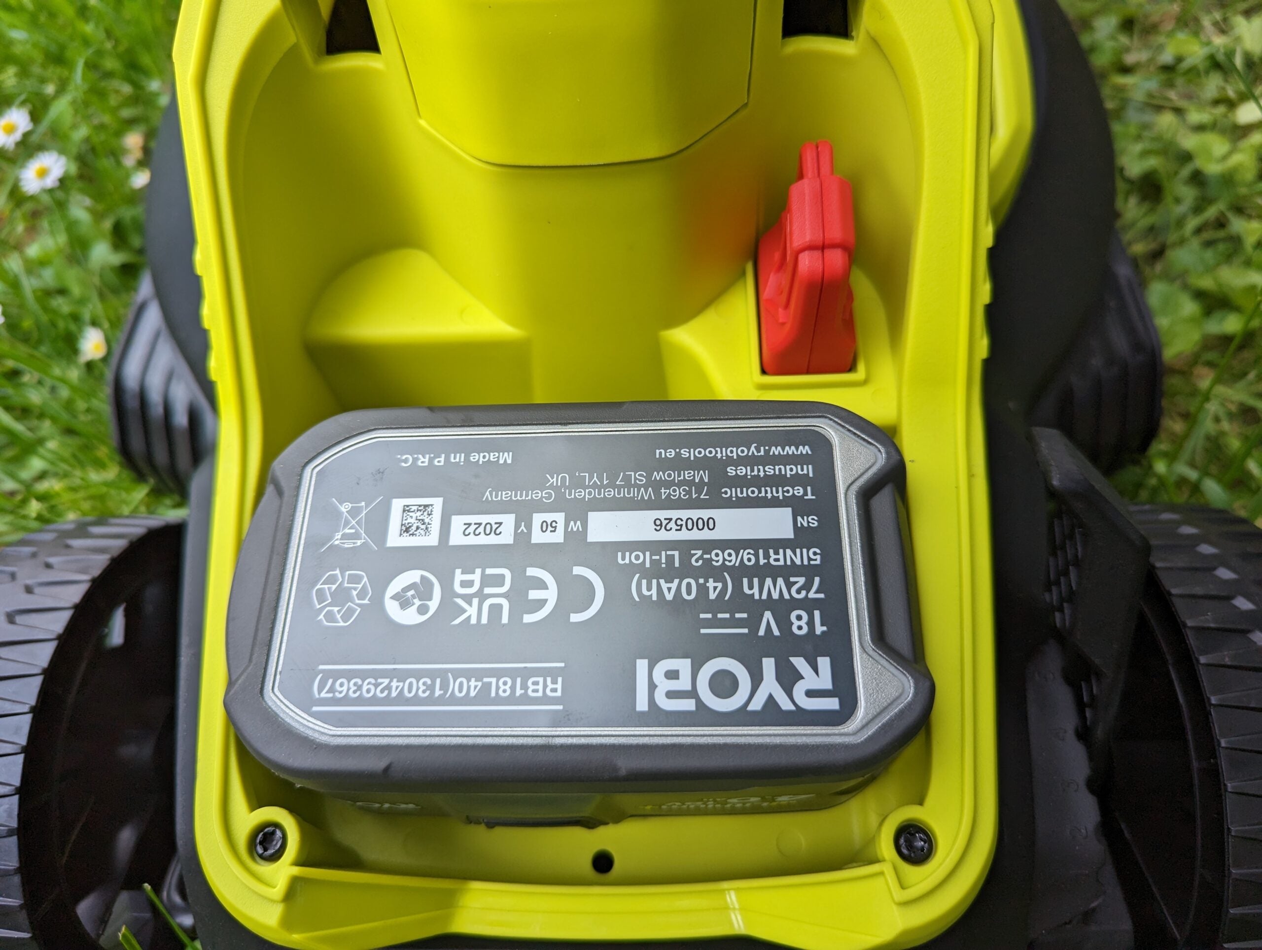 Ryobi One+ Cordless 33cm Lawnmower battery installed