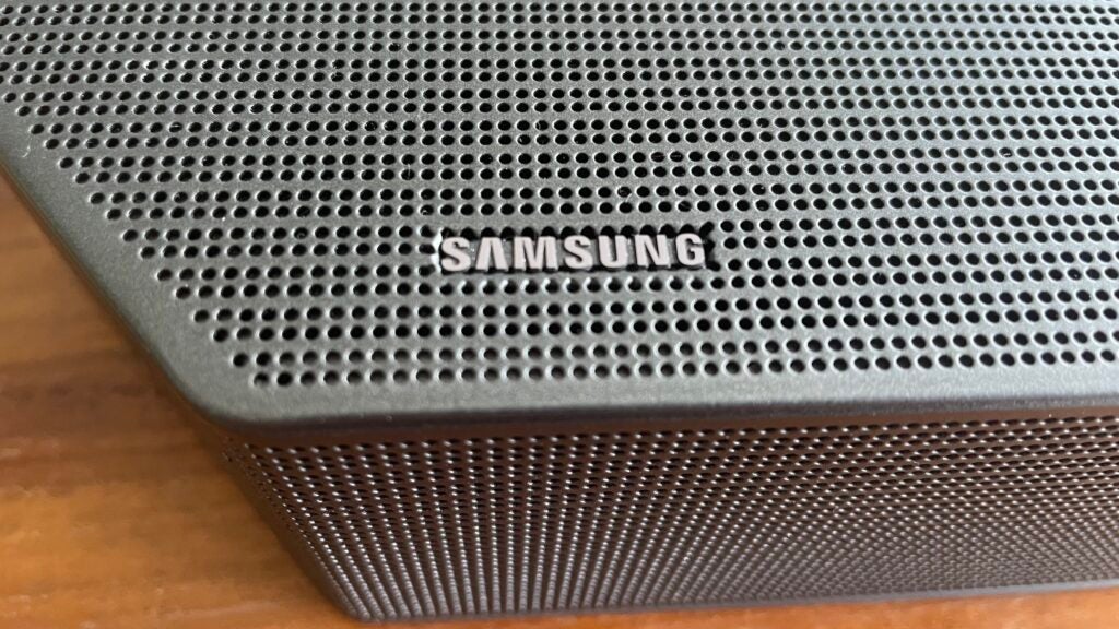 Logo detail of the Samsung HW-Q990C soundbar.