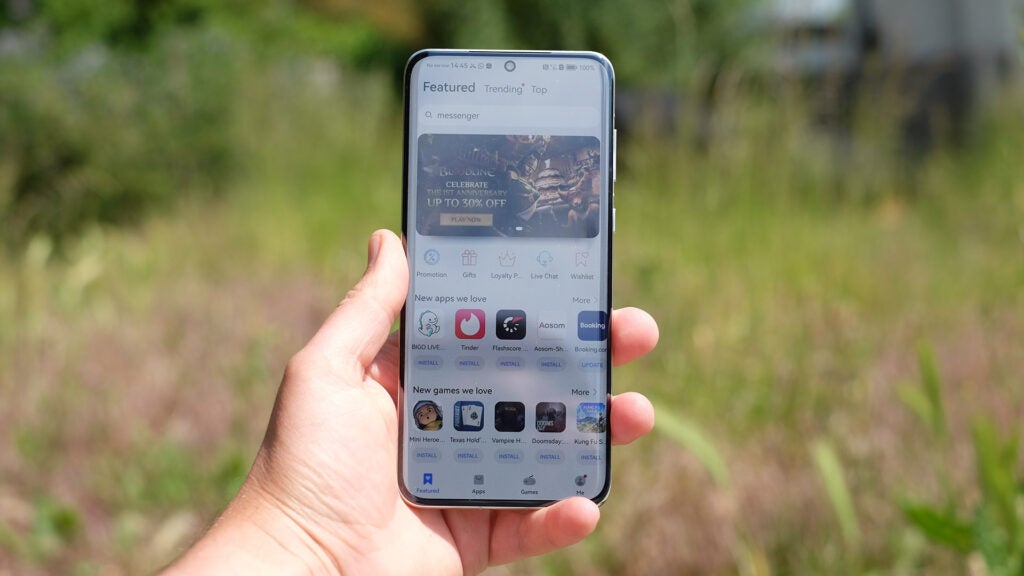 Huawei P60 Pro in-hand showing the display