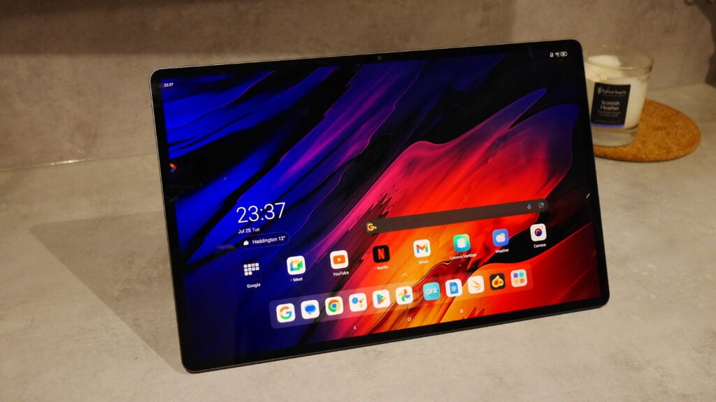 Lenovo Tab Extreme on a table top with the Home screen active