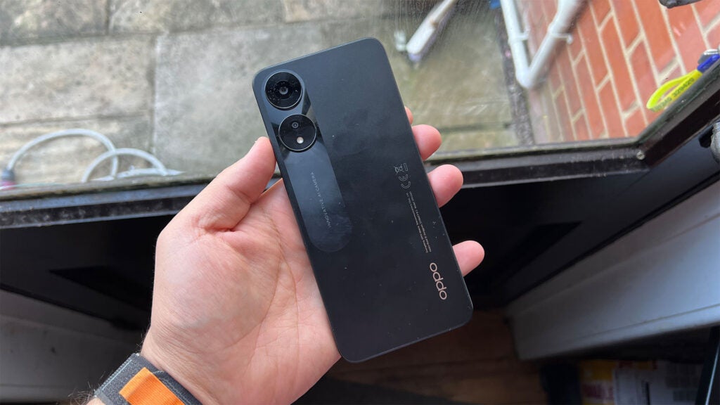 Oppo A78 5G in-hand showing the rear design
